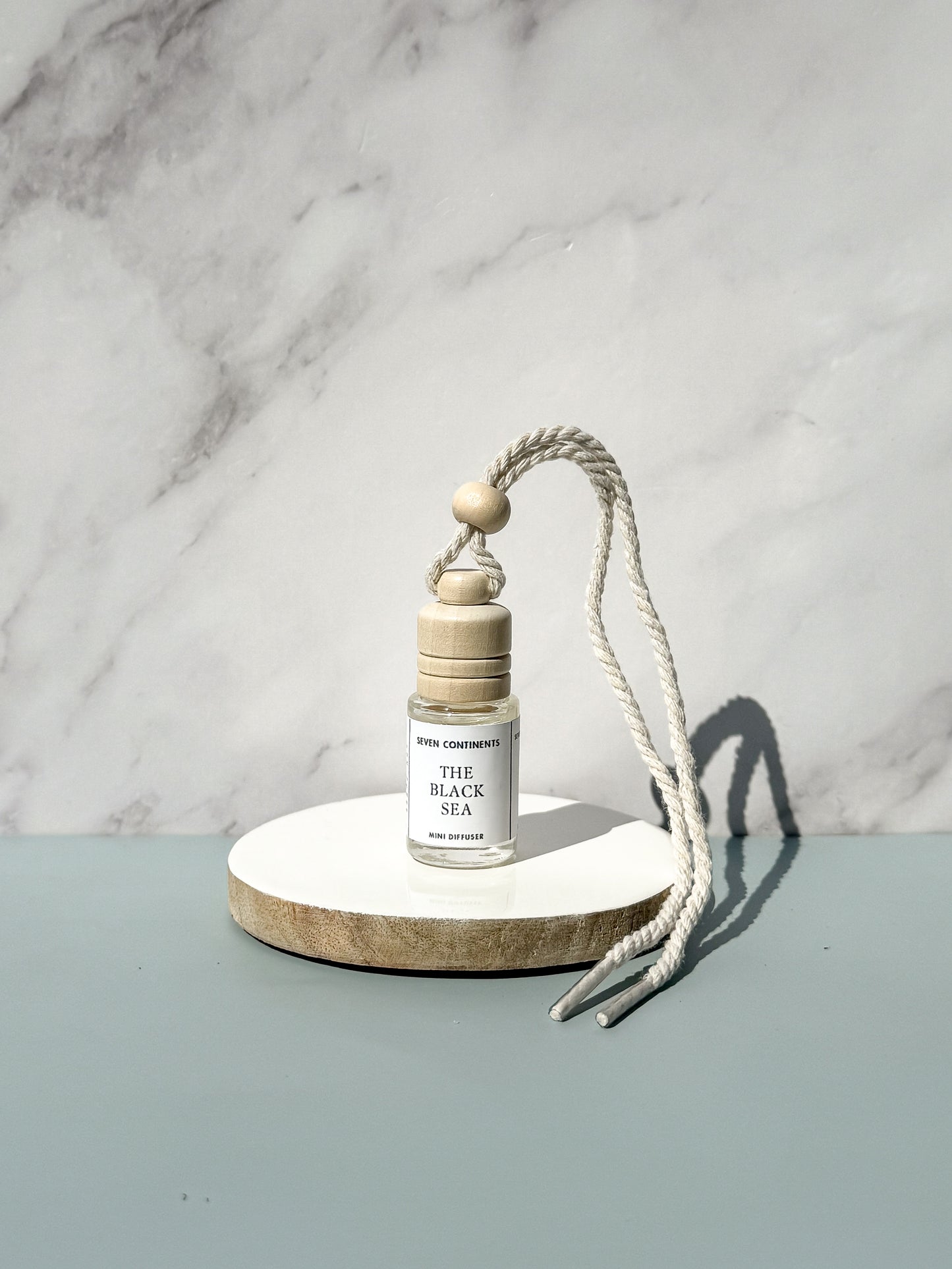 The Black Sea car diffuser with plum, musk, and sea salt fragrance