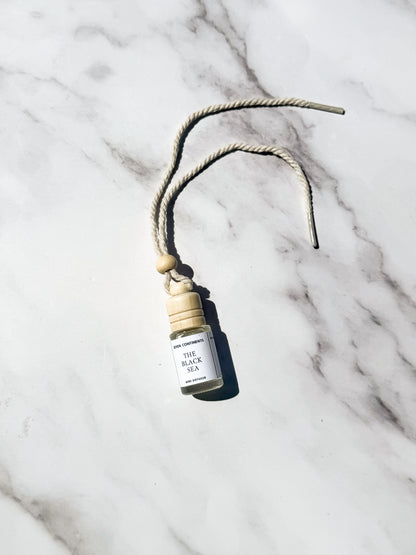 The Black Sea car diffuser with plum, musk, and sea salt fragrance