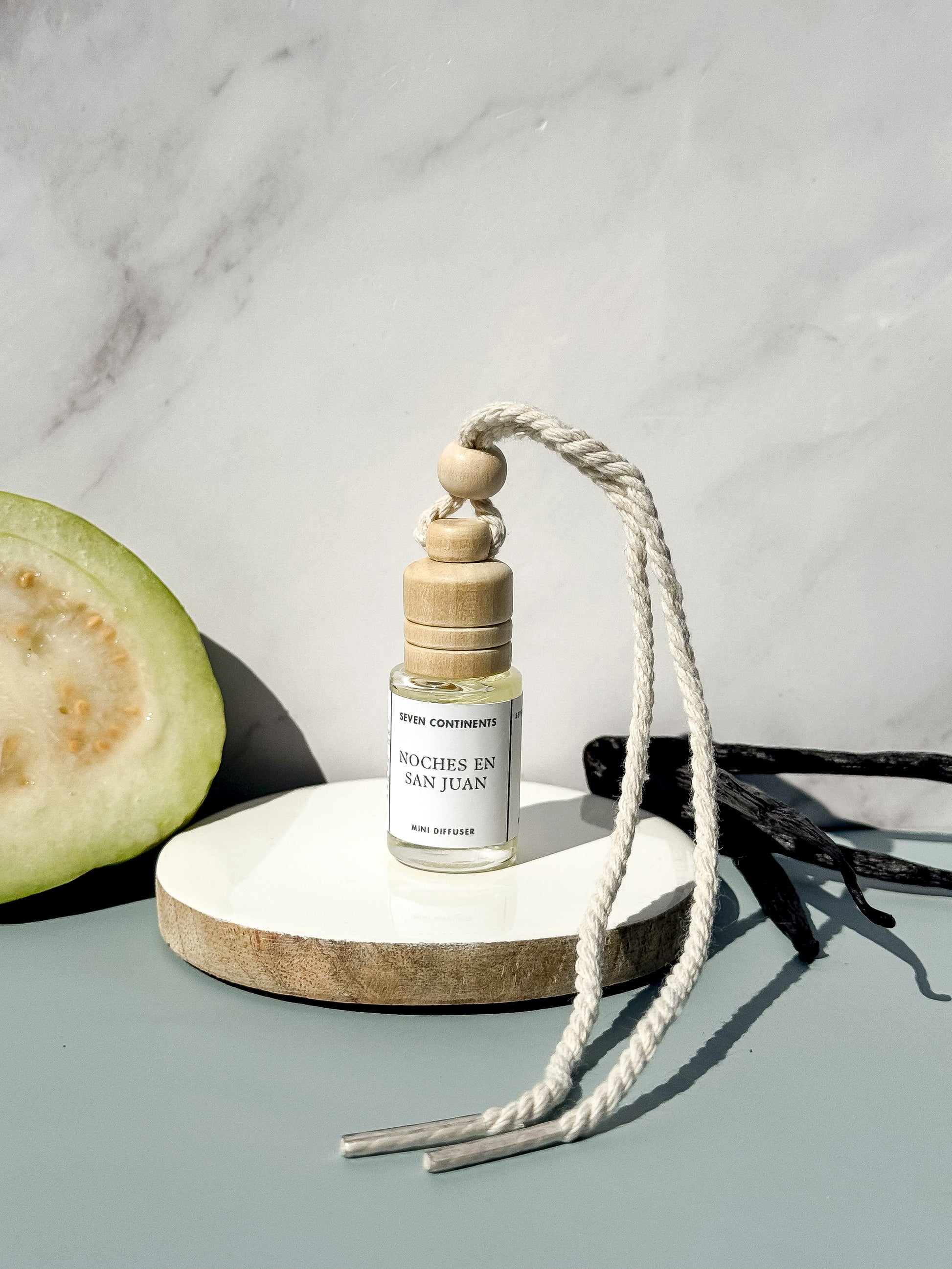 Noches en San Juan car diffuser with guava, vanilla, woods, and musk fragrance