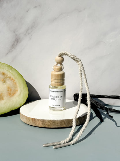Noches en San Juan car diffuser with guava, vanilla, woods, and musk fragrance
