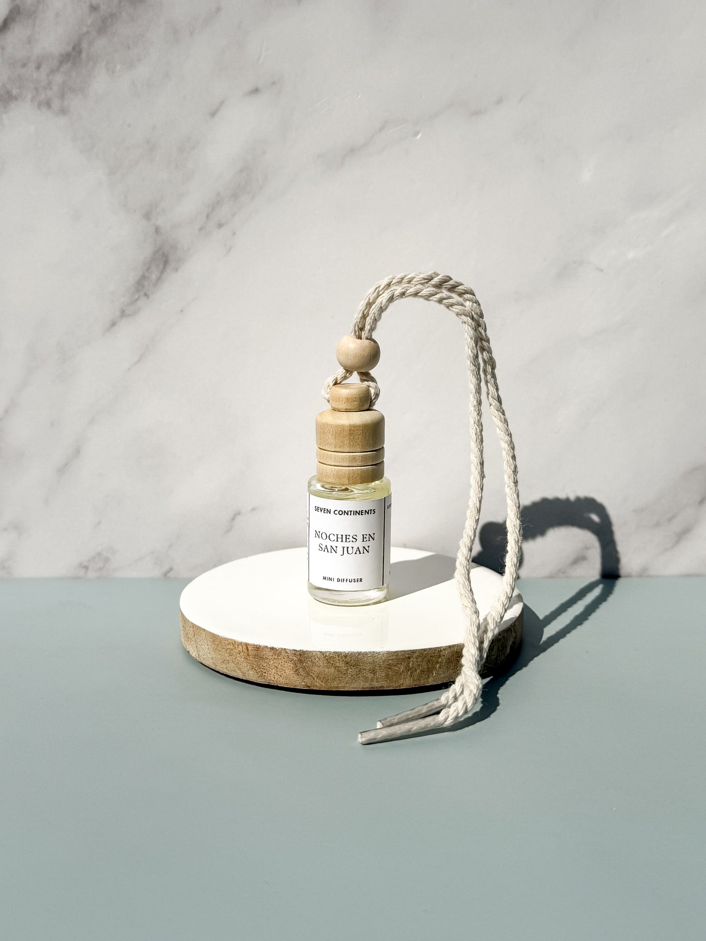 Noches en San Juan car diffuser with guava, vanilla, woods, and musk fragrance