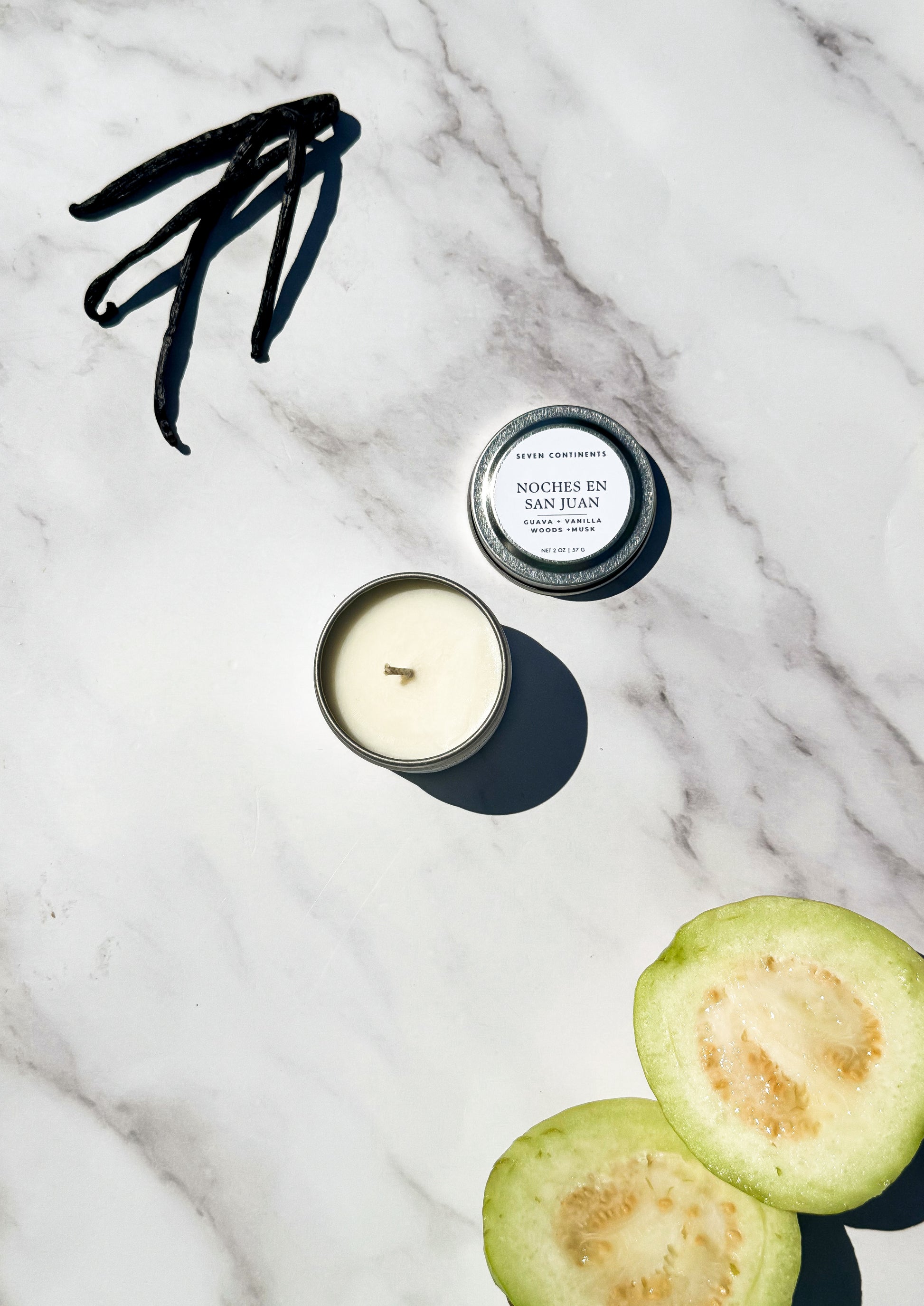 Mini Noches en San Juan candle with guava, vanilla, woods, and musk scent