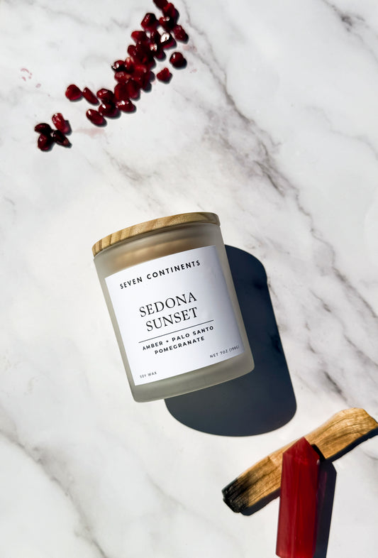Sedona Sunset soy candle with amber, palo santo, and pomegranate fragrance
