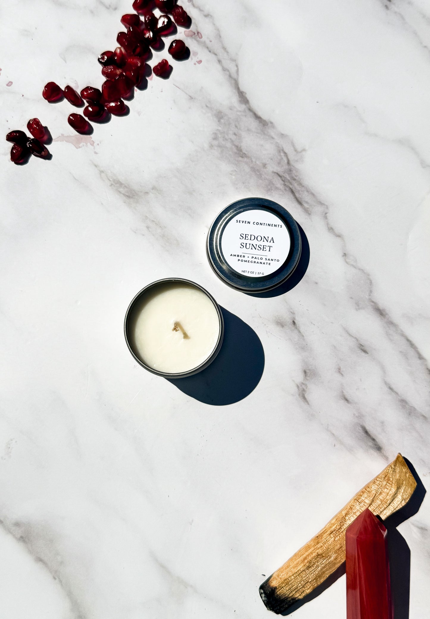 Mini Sedona Sunset candle with amber, palo santo, and pomegranate scent