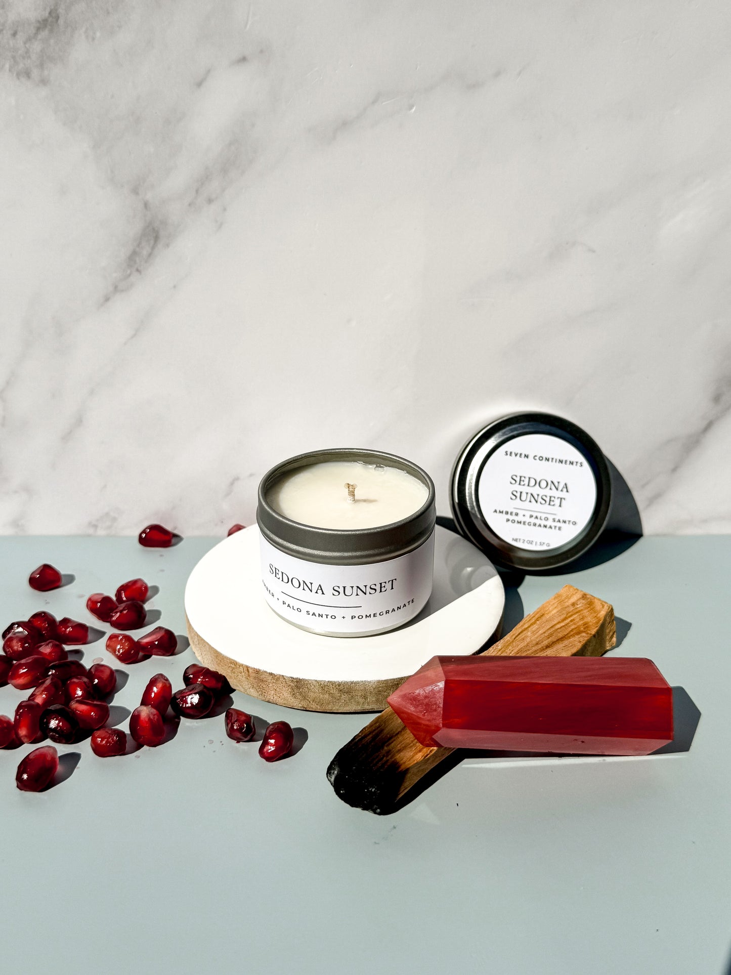 Mini Sedona Sunset candle with amber, palo santo, and pomegranate scent