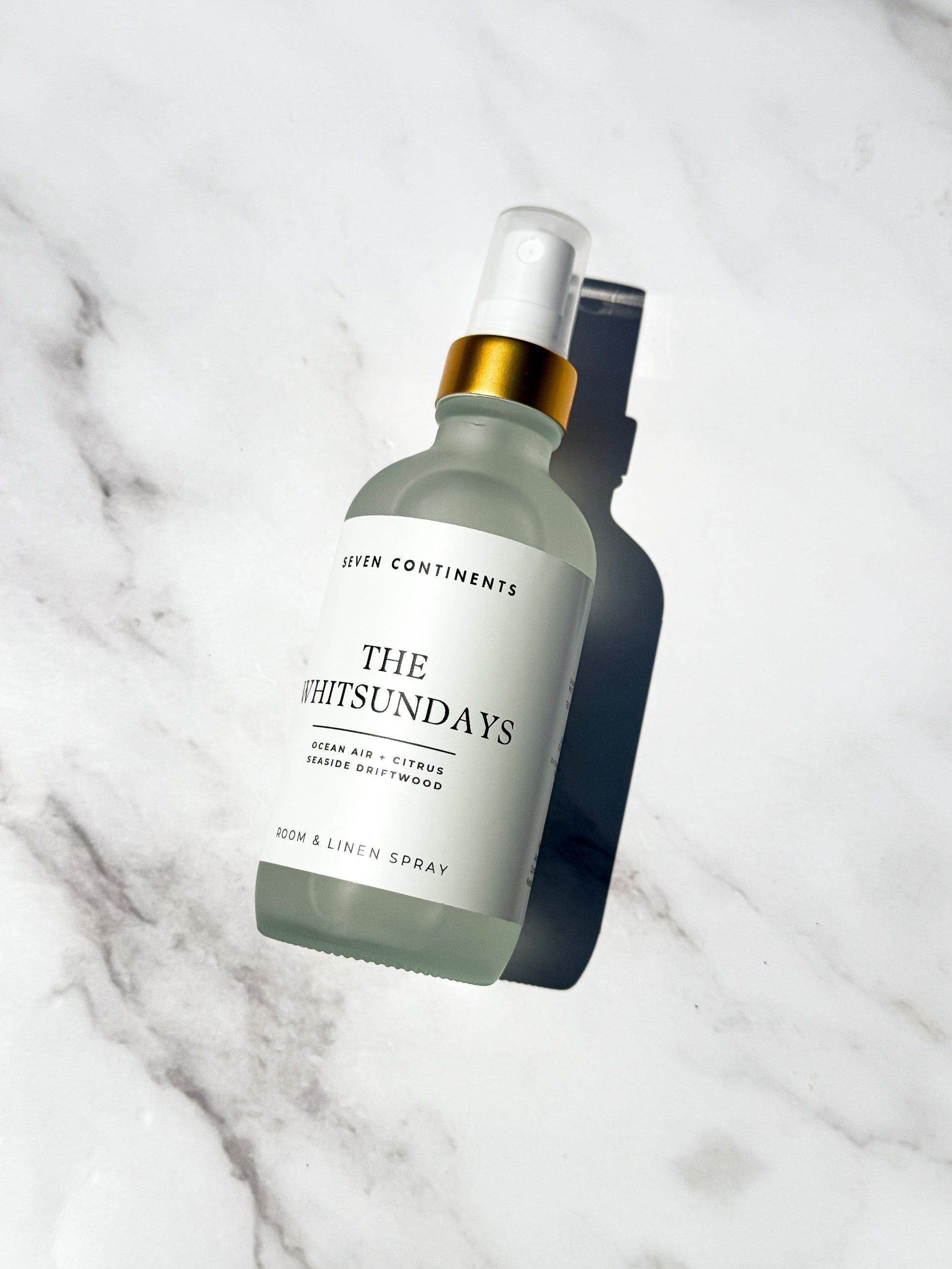 The Whitsundays luxury room and linen spray with ocean air, citrus, and seaside driftwood fragrance